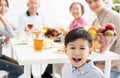 Asian family having dinnerÃÂ at home Royalty Free Stock Photo